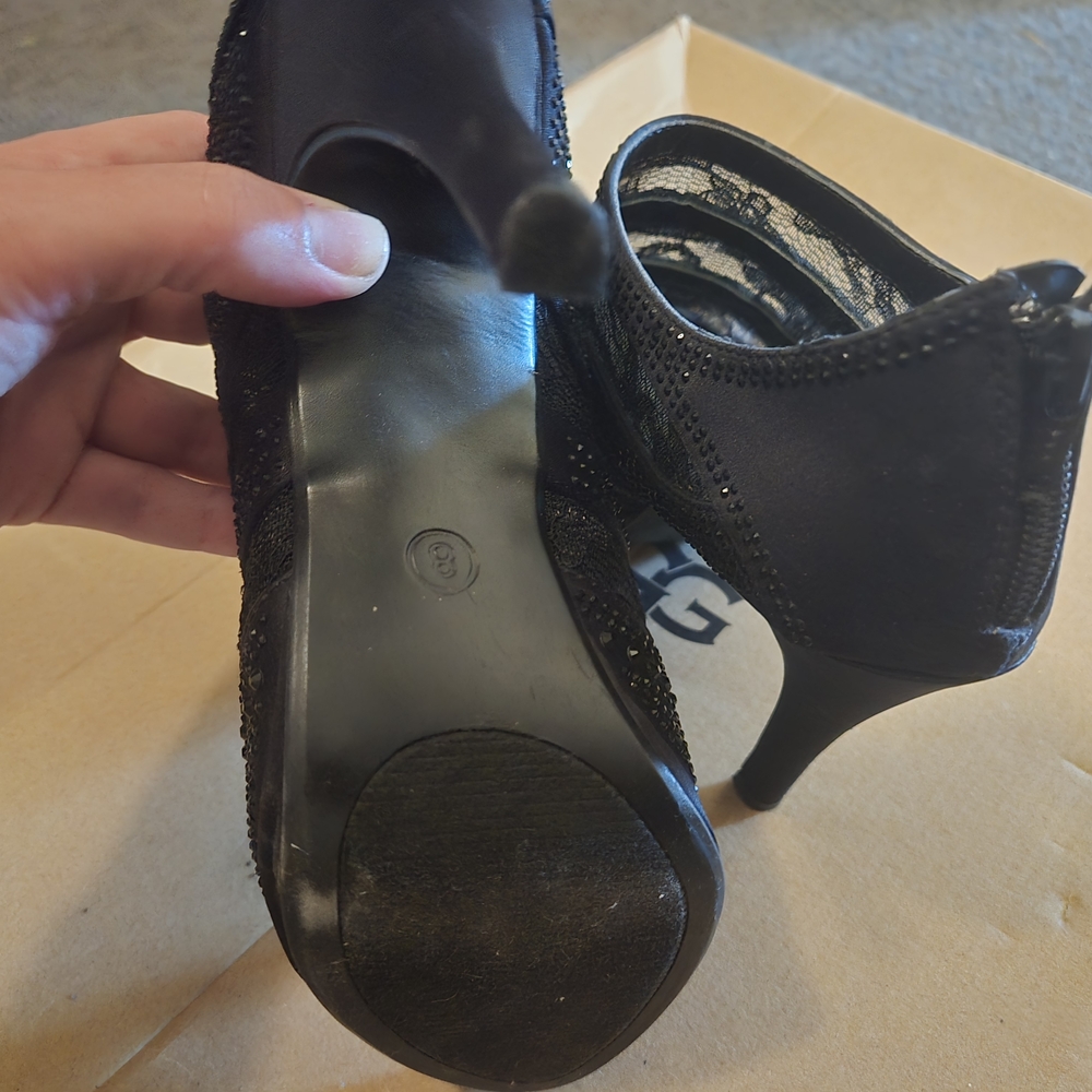 Coach and Four Black Heels Sleek Design